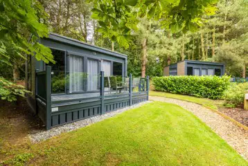 Studio pod ensuite cabin with private decking and outdoor seating Studio pod ensuite cabin with private decking and outdoor seating