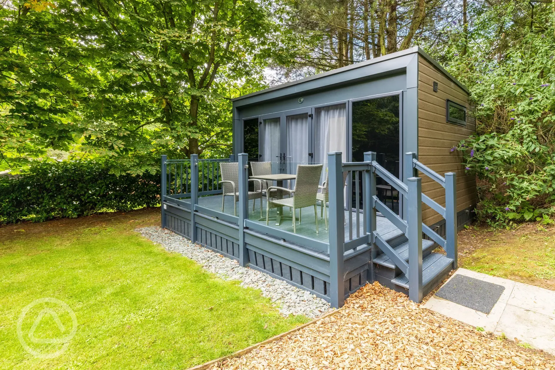 Studio pod ensuite cabin with private decking and outdoor seating 