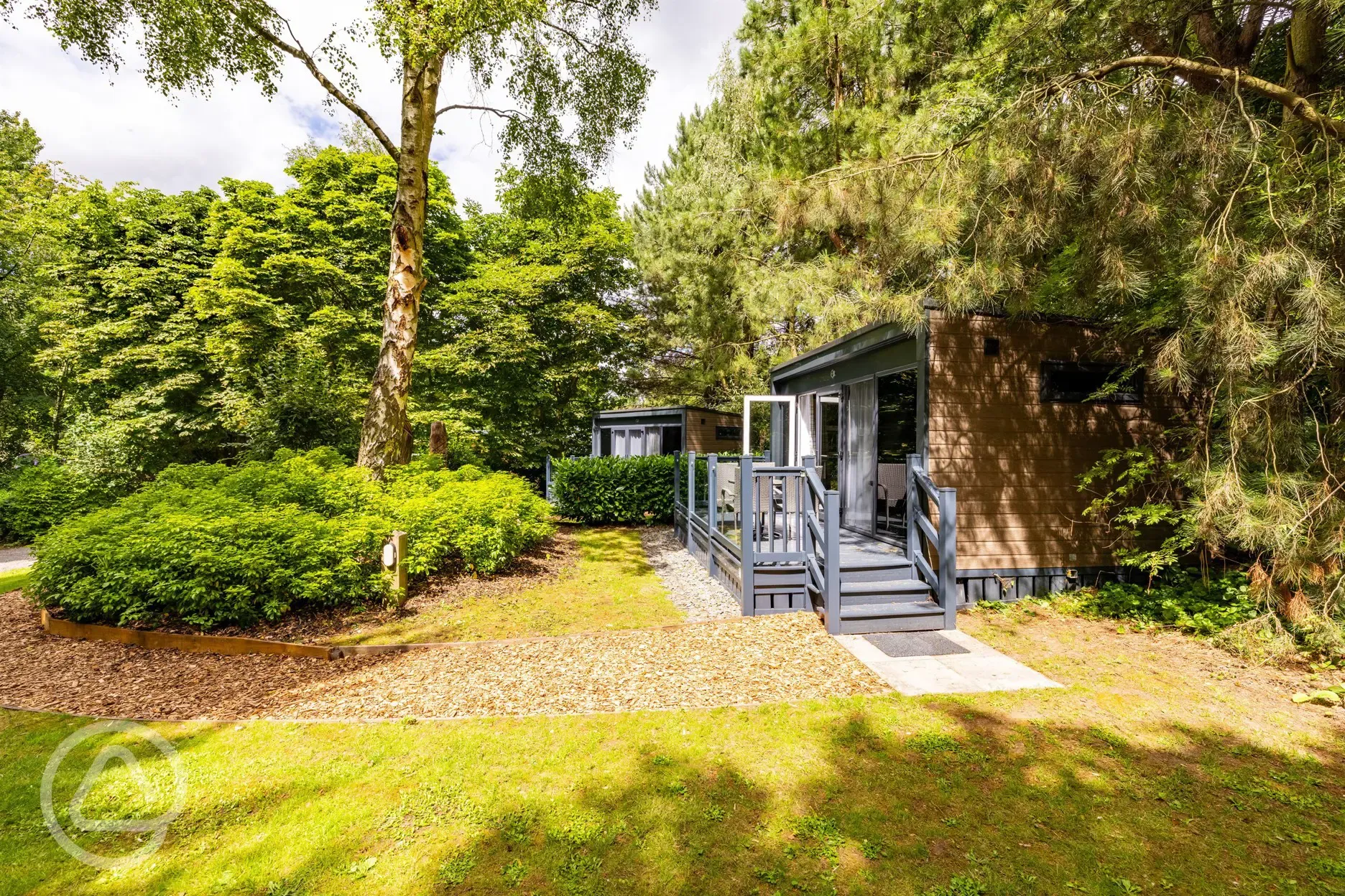 Studio pod ensuite cabin with private decking and outdoor seating 
