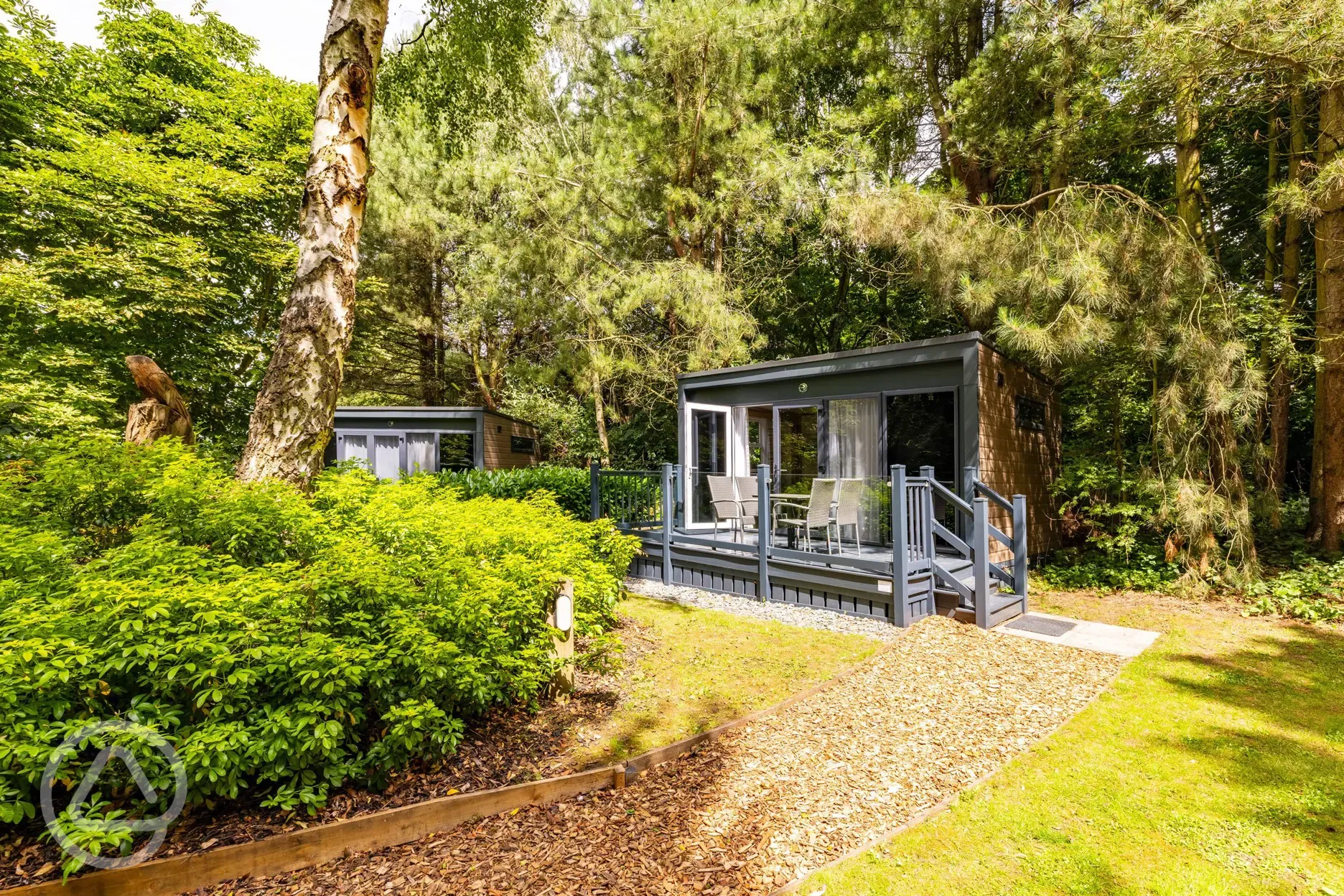 Studio pod ensuite cabin with private decking and outdoor seating 