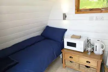 Twin bed glamping pod interior