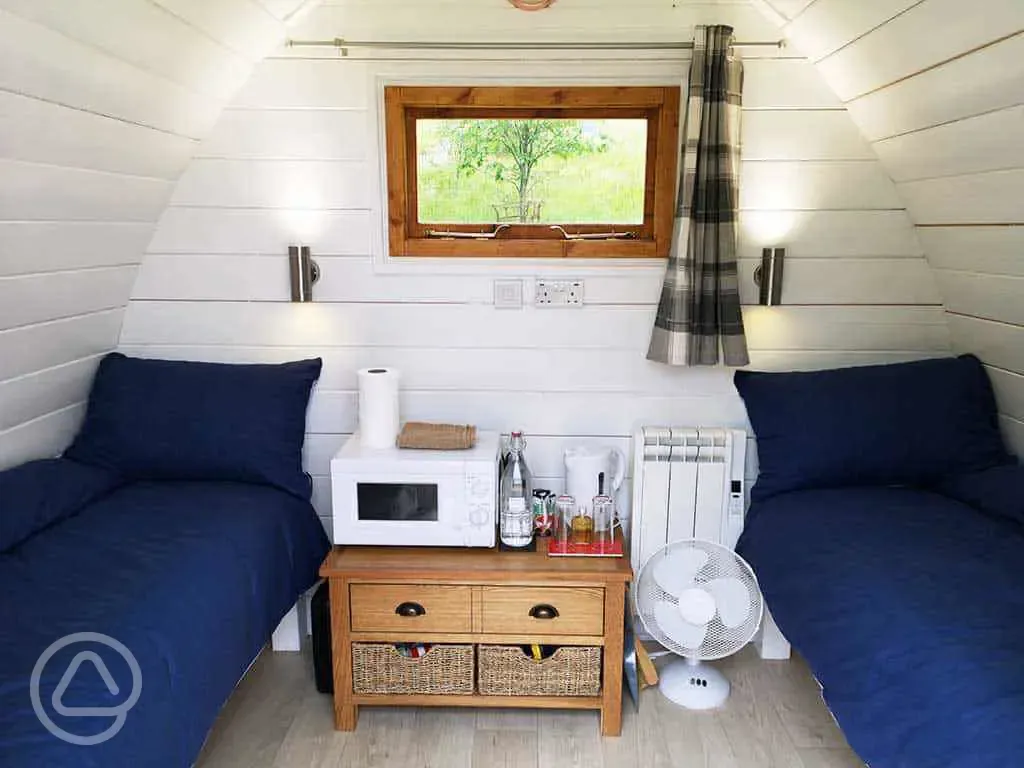 Twin bed glamping pod interior