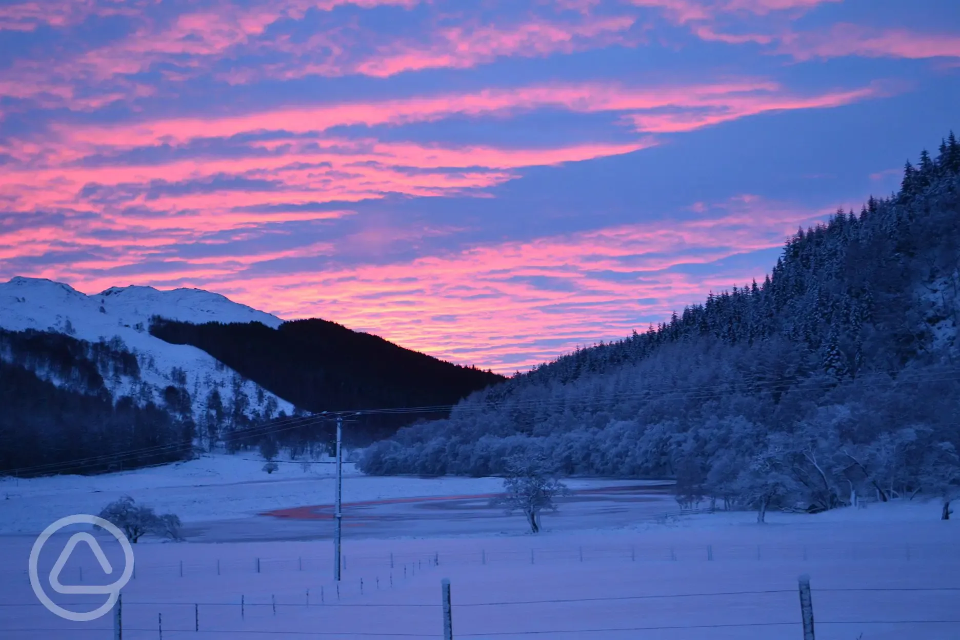 Sunrise over the loch in winter