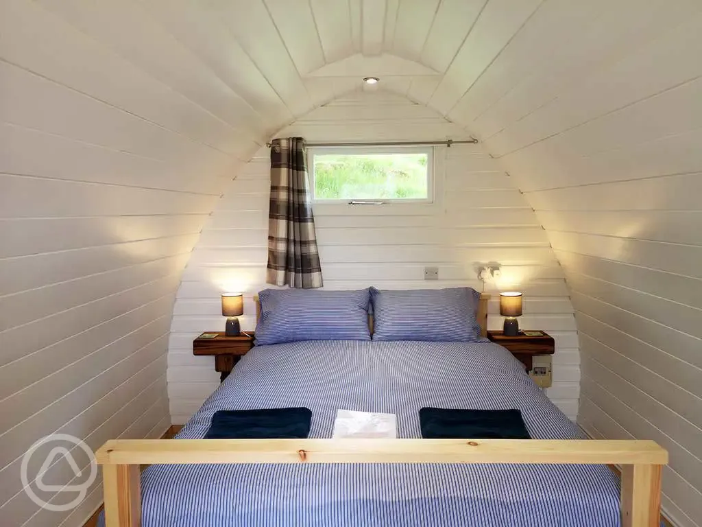 Double bed glamping pod interior