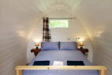 Double bed glamping pod interior