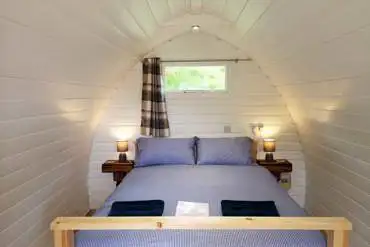 Double bed glamping pod interior