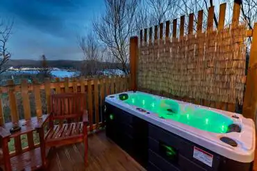 Two-persons hot tub outside Suilven View ensuite glamping pod 