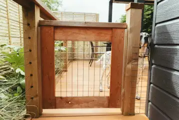 Dog friendly glamping cabins - fenced outside area for dog security Dog friendly glamping cabins - fenced outside area for dog security