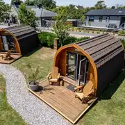 Camping pods with a deck area with table and chairs Camping pods with a deck area with table and chairs