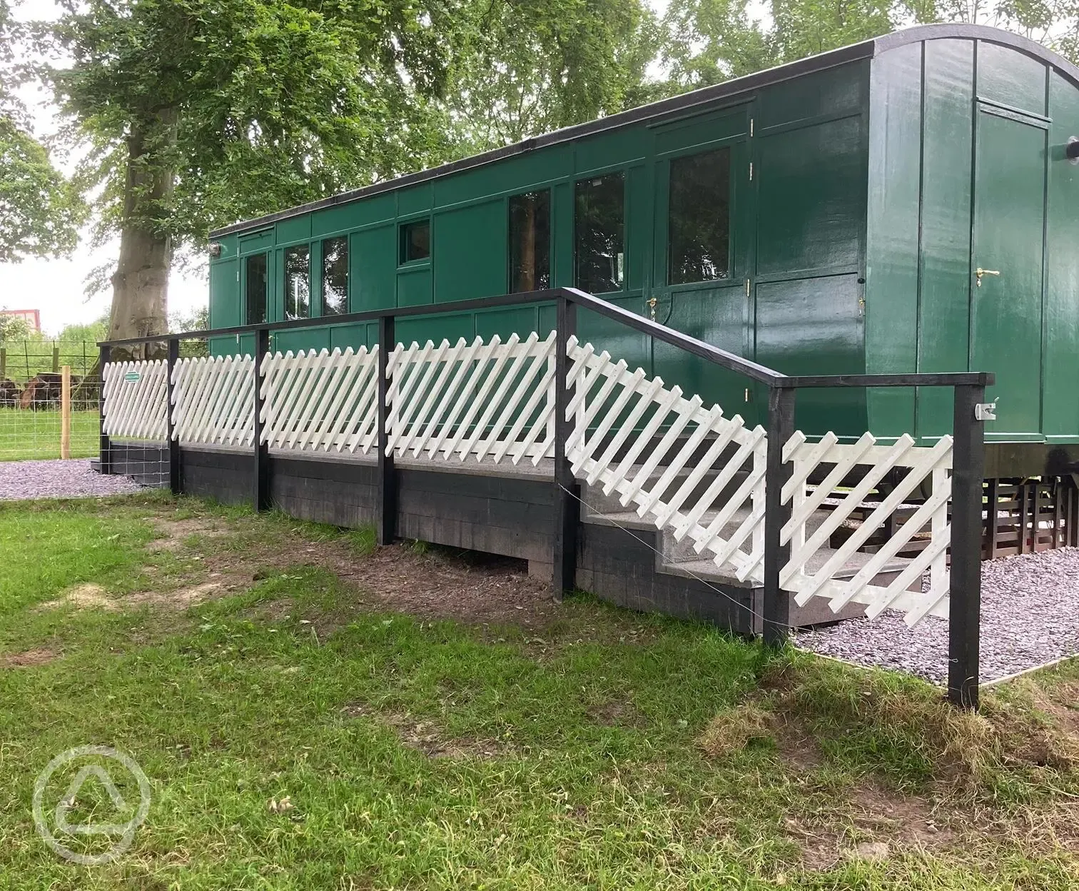 Henrietta Train Carriage fenced off area at Eden Valley Glamping