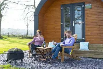 Cross Fell pod outdoor seating and fire pit at Eden Valley Glamping Cross Fell pod outdoor seating and fire pit at Eden Valley Glamping