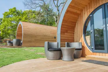 Glamping pods and outdoor seating