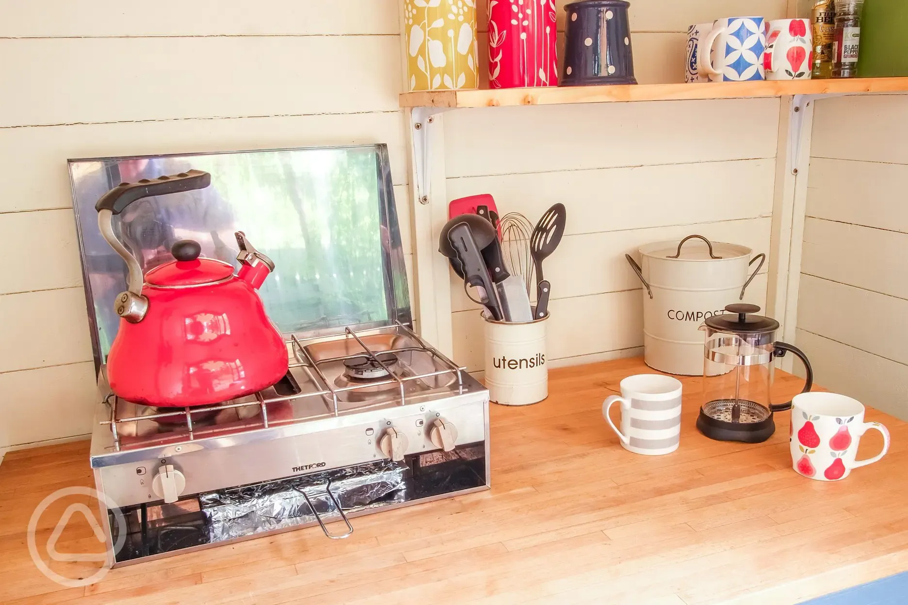 Private equipped kitchen huts with a hob and fridge