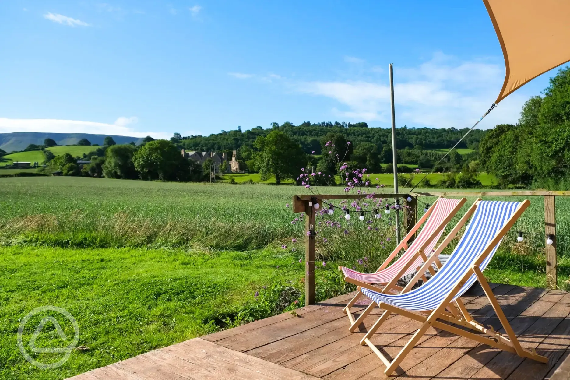 Glamping cabin outdoor deck with tradtional deck chairs