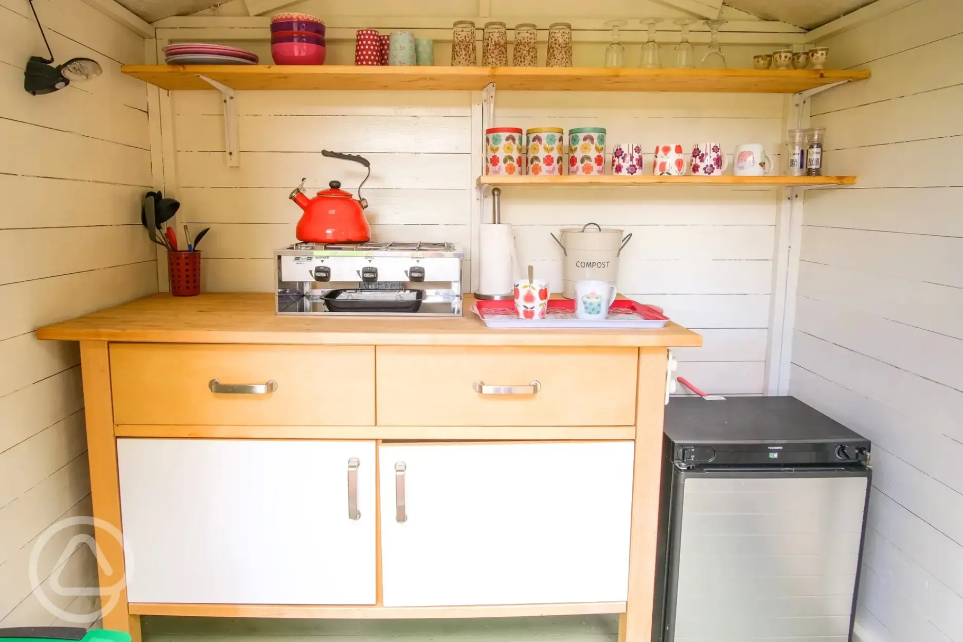 Private equipped kitchen huts with a hob and fridge