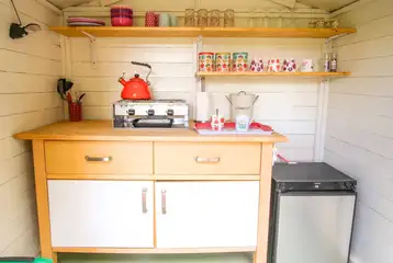 Private equipped kitchen huts with a hob and fridge