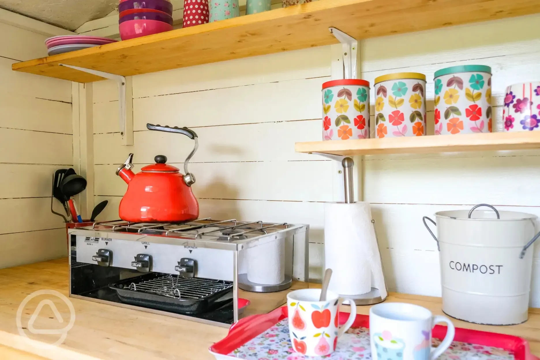 Private equipped kitchen huts with a hob and fridge