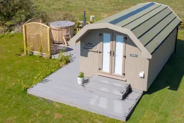 Elite ensuite glamping pod with wood-fired hot tub Elite ensuite glamping pod with wood-fired hot tub