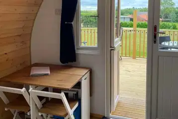 Bluebell glamping pod seating area and views - pet free