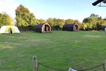 Grass pitches and camping pods