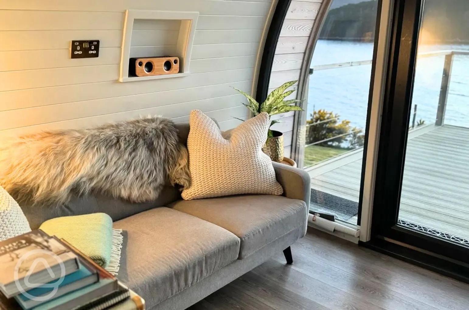 Sildvik and Sunset ensuite glamping pod interiors with a sofa