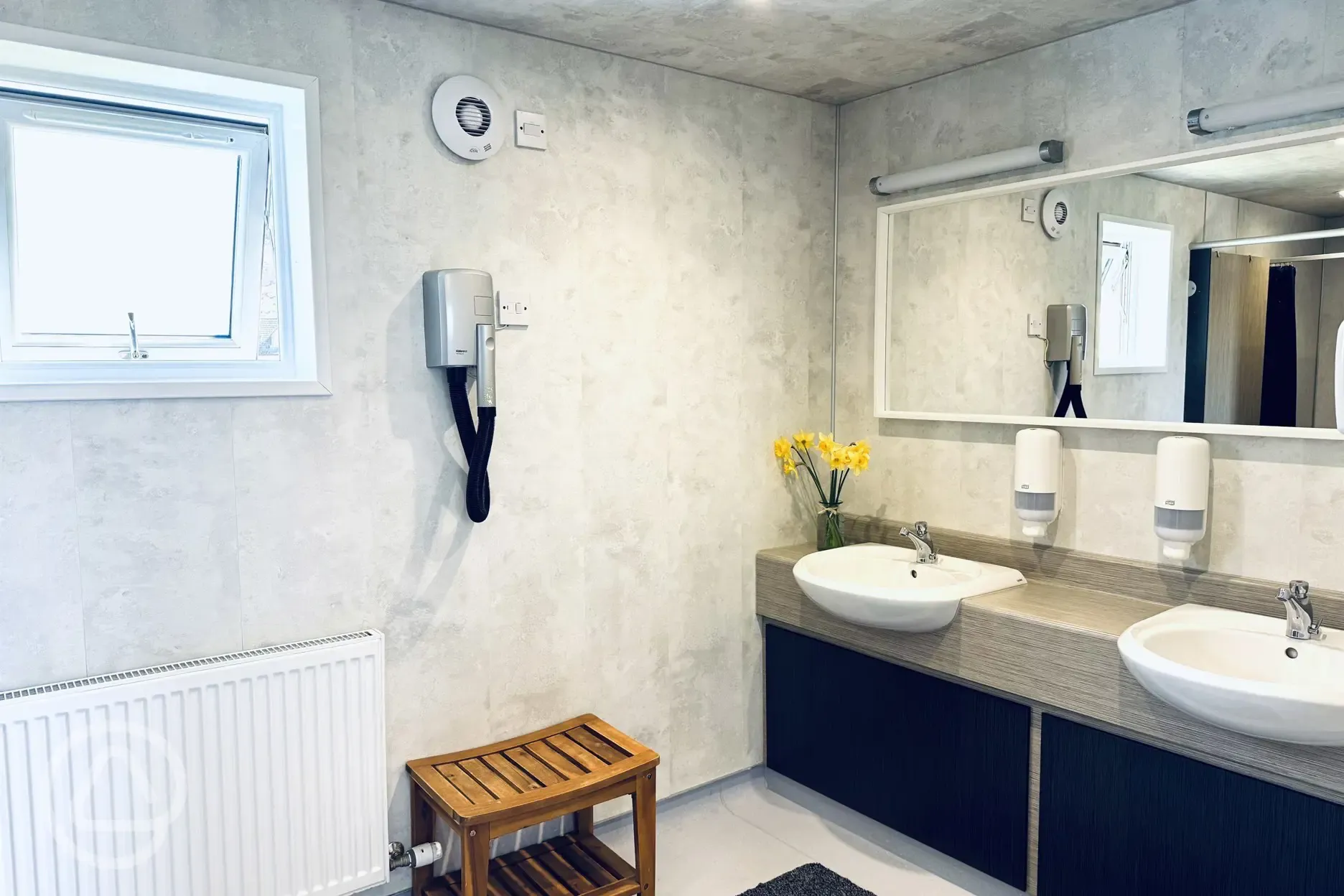 Facilities with hand basins and hair dryers