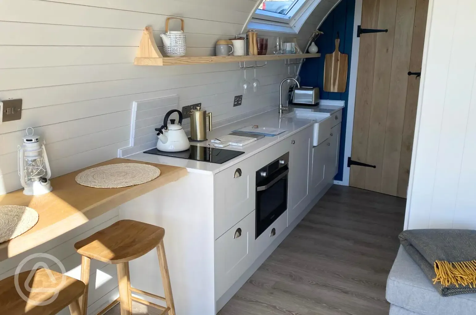 Sildvik and Sunset ensuite glamping pod interiors with a kitchenette