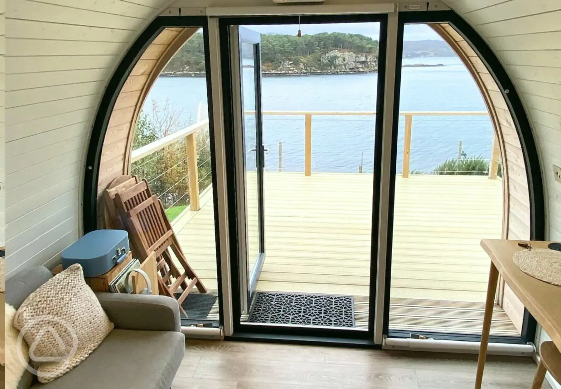 Sildvik and Sunset ensuite glamping pod interiors with a sofa