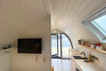 Sildvik and Sunset ensuite glamping pod interiors with a smart TV