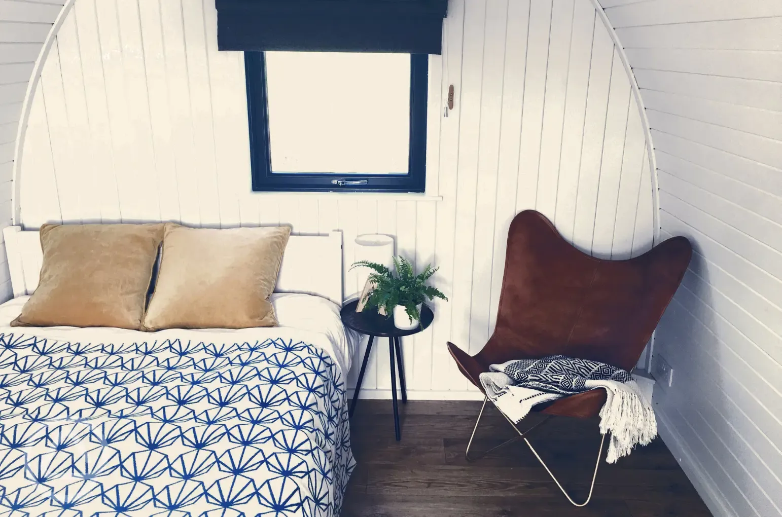 Sea Eagle glamping pod interior with a double bed