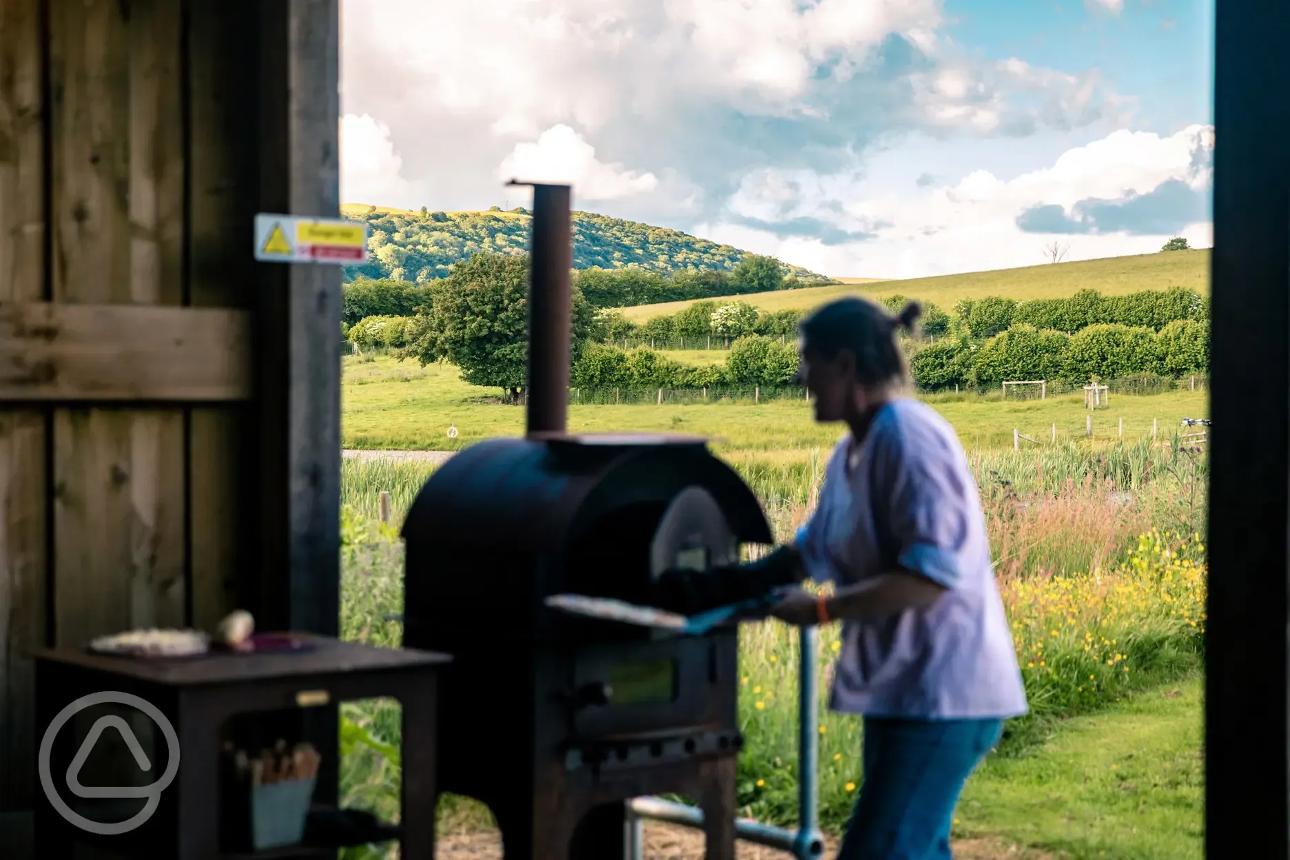 Communal sheltered area with a pizza oven