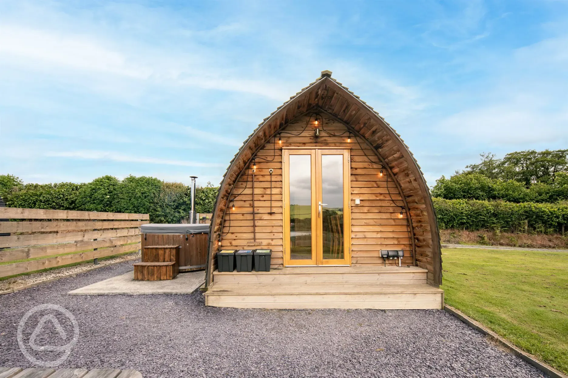 Glamping pod with a private wood-fired hot tub