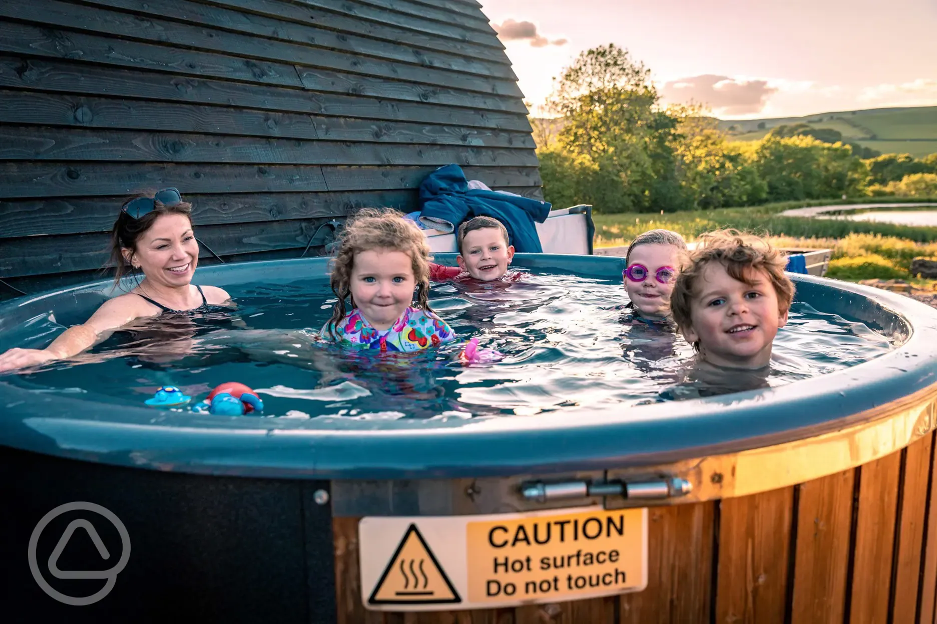Private wood-fired hot tubs with room for the family