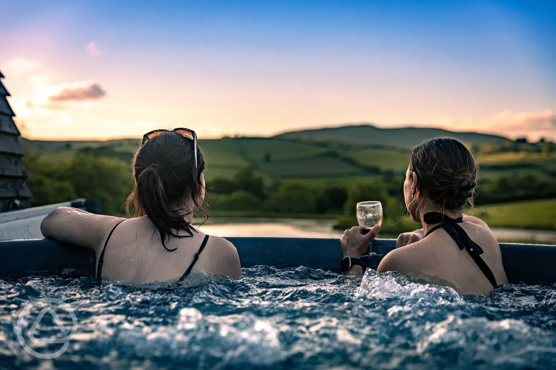 Private wood-fired hot tubs with sunset views
