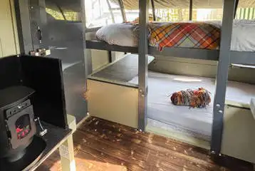 Saltings Landpod interior with beds (bedding available to hire)
