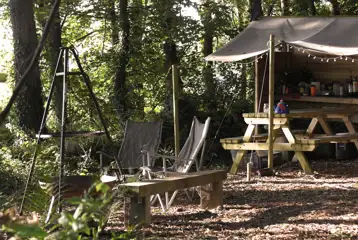 Private covered outdoor camping kitchen area and fire pit