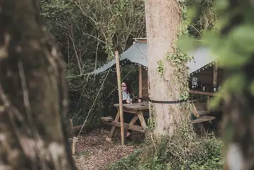 Private covered outdoor camping kitchen area