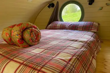 Mezzanine eco ensuite glamping pod bed