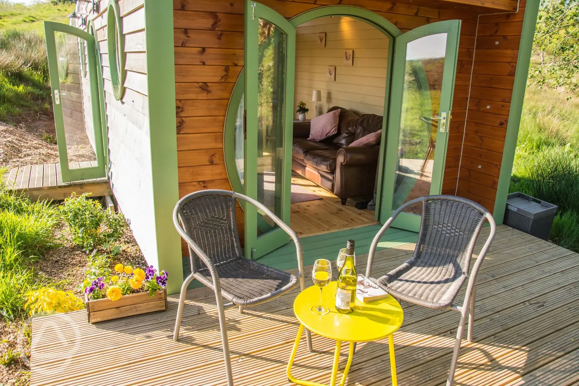 Mezzanine eco ensuite glamping pod outdoor seating area 