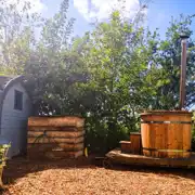 Peacock camping pod with hot tub