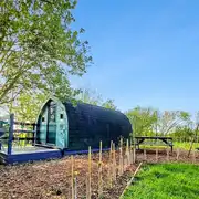 Peacock camping pod and hot tub at Moss Rose Campsite Peacock camping pod and hot tub at Moss Rose Campsite
