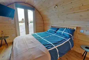 Llys y Llwynogod pod double bedroom (bedding included) with a smart TV