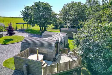 Llys y Llwynogod five person pod with an outdoor deck and hot tub Llys y Llwynogod five person pod with an outdoor deck and hot tub