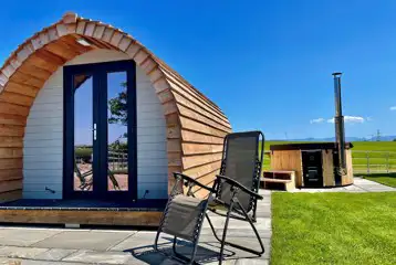 Cennin Pedr and Pabi ensuite glamping pod with hot tub at Pods Pwll Coch