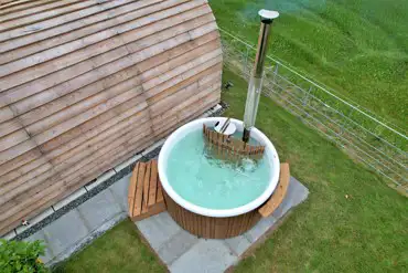 Glamping pod with hot tub