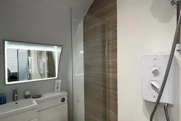 Glamping pod ensuite wetroom bathroom with an electric shower Glamping pod ensuite wetroom bathroom with an electric shower