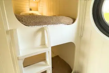 Glamping pod bunk beds with a small ladder (bedding provided) Glamping pod bunk beds with a small ladder (bedding provided)