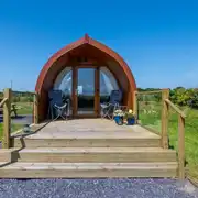 Ensuite glamping pod exterior with private decking Ensuite glamping pod exterior with private decking