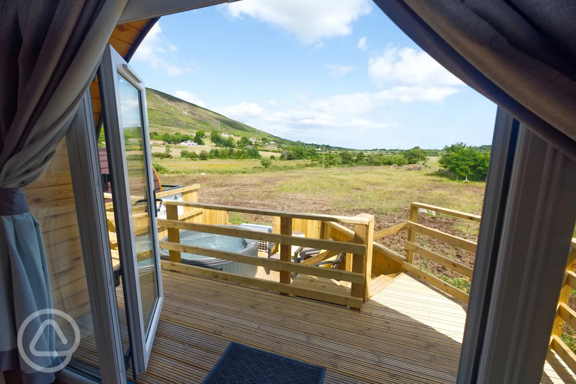 Glamping pod with hot tub views