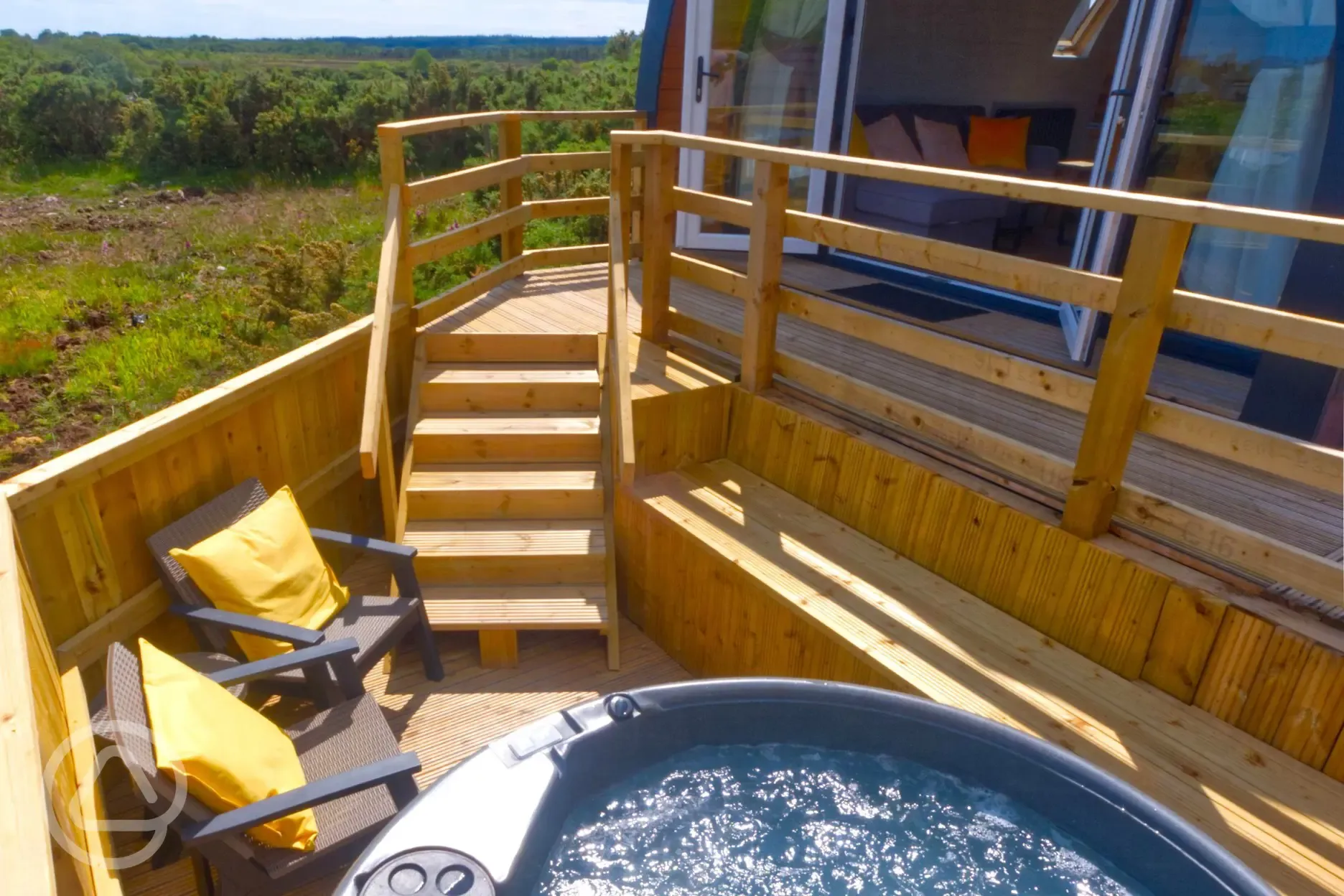 Glamping pod with hot tub